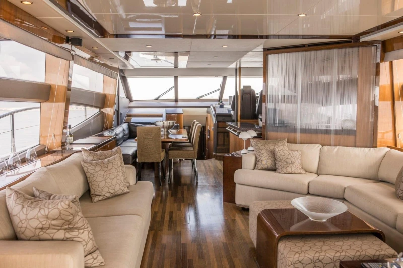 Luxurious interior of 2013 Princess 72 Motor Yacht with elegant seating and dining area.