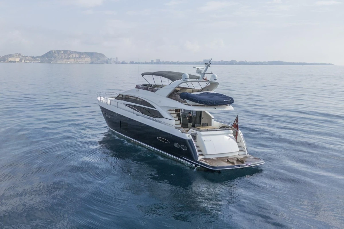 Luxurious 2013 Princess 72 Motor Yacht cruising on calm waters.