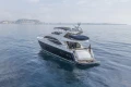 Luxurious 2013 Princess 72 Motor Yacht cruising on calm waters.