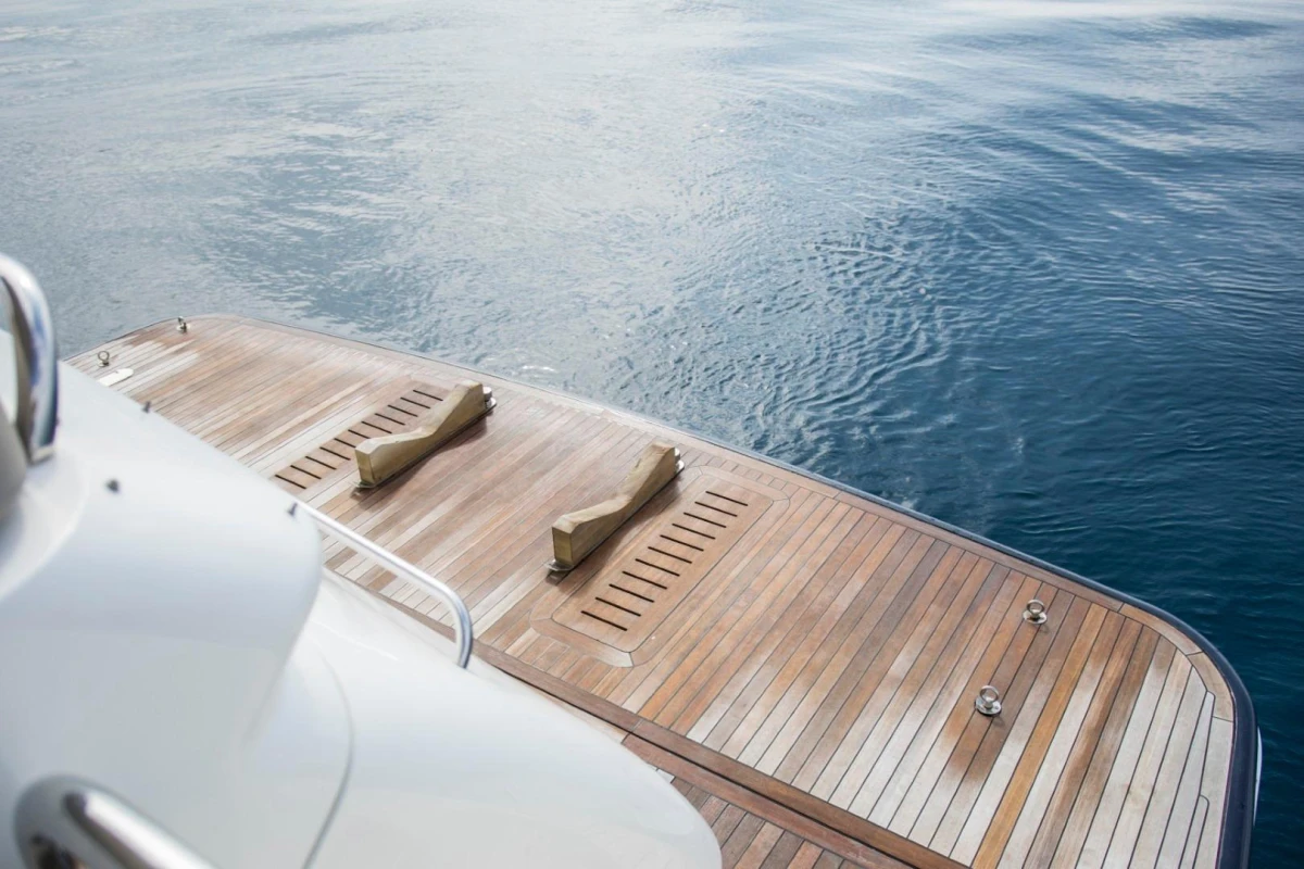 Luxury Princess 72 Motor Yacht 2013, teak deck overlooking calm ocean waters.