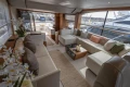 Luxurious interior of 2020 Princess F62 yacht with elegant seating and decor.