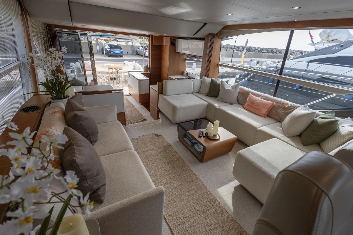 Luxurious interior of 2020 Princess F62 yacht with elegant seating and decor.