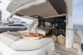 Luxurious 2020 Princess F62 yacht with elegant outdoor seating and modern interior design.