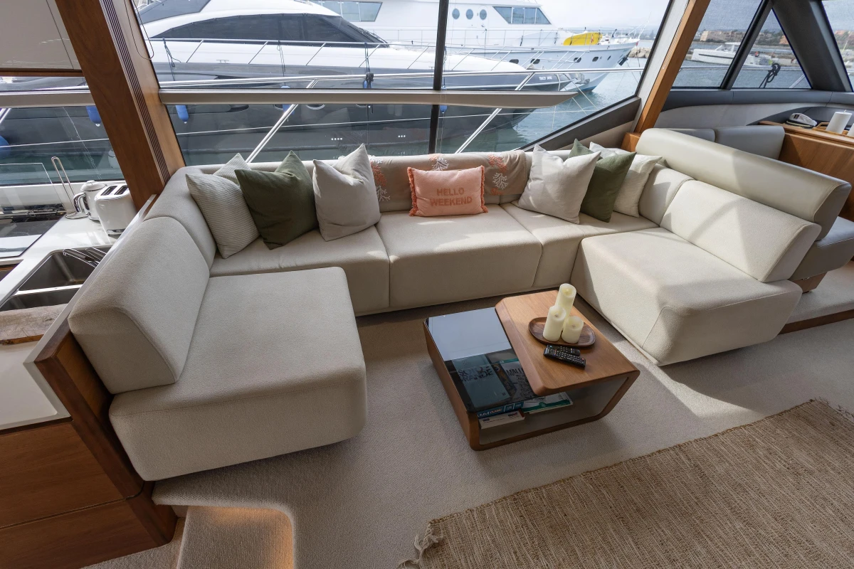 Luxurious interior of 2020 Princess F62 yacht with elegant seating and decor.