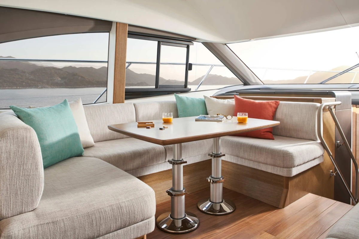 Luxurious interior of 2023 Princess F45 yacht with elegant seating and scenic views.