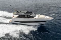 2023 Princess V50 Open yacht cruising on open sea, showcasing sleek design and luxury.