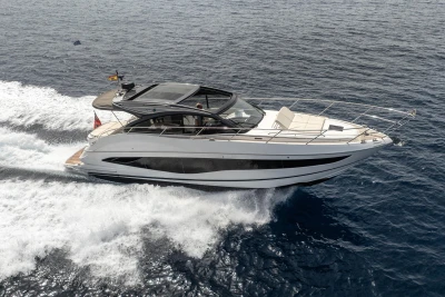 2023 Princess V50 Open yacht cruising on open sea, showcasing sleek design and luxury.