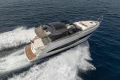 2023 Princess V50 Open yacht cruising on open sea, showcasing sleek design and luxury.