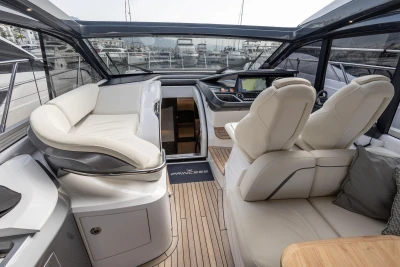 2023 Princess V50 Open yacht interior with luxurious seating and modern navigation system.