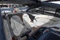 Luxurious interior of 2023 Princess V50 Open yacht with elegant white seating.