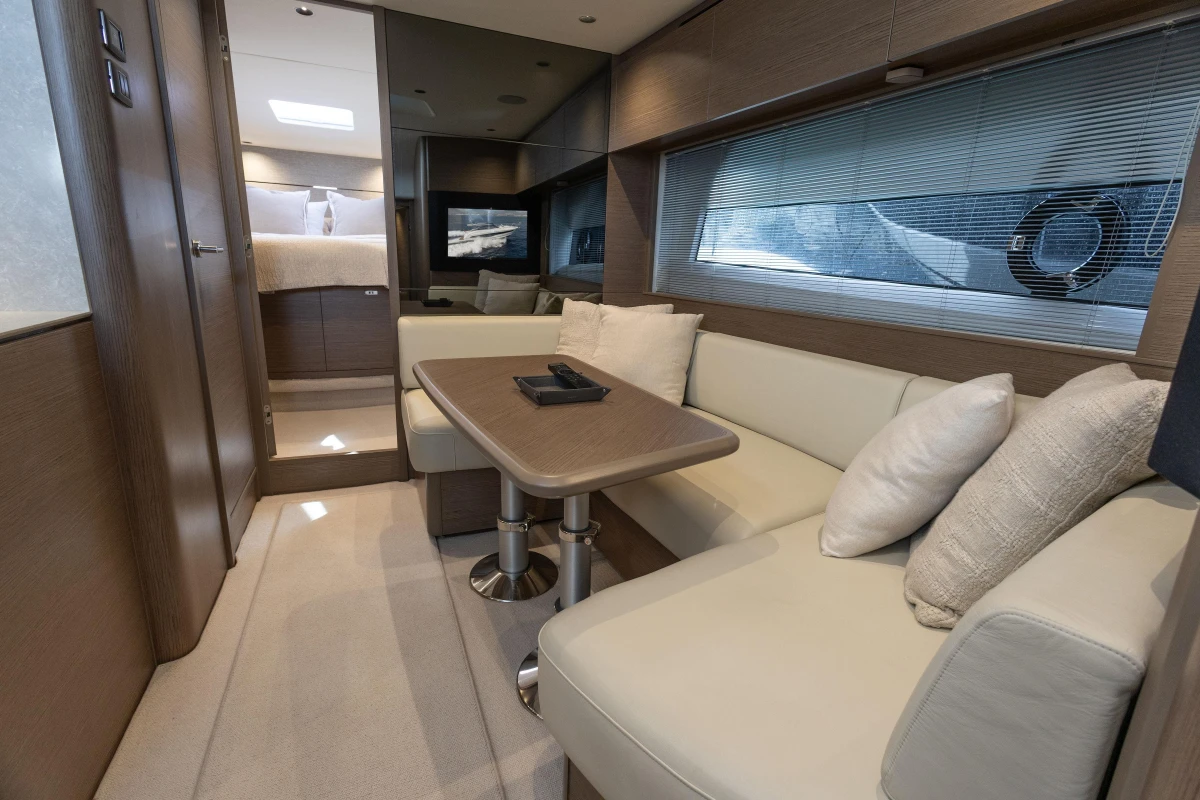 Luxurious interior of 2023 Princess V50 Open yacht with elegant seating and modern design.