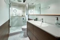 Luxurious bathroom in 2025 Princess F65 yacht, featuring modern fixtures and elegant design.