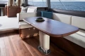 Luxurious interior of 2025 Princess F65 yacht with elegant wood finishes and ocean view.
