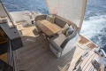 Luxurious 2018 Princess 49 yacht deck with elegant seating and ocean view.