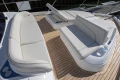 Luxurious seating on 2025 Princess F58 yacht with elegant teak decking.