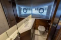 Luxurious bathroom interior of 2025 Princess F58 yacht with modern fixtures and elegant design.