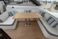 Luxurious 2017 Princess V48 Open yacht interior with elegant seating and wooden table.