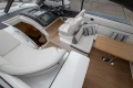 2017 Princess V48 Open yacht interior with plush seating and wooden flooring.