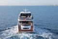 Luxury Princess X80 yacht cruising on open sea, 2026 model.