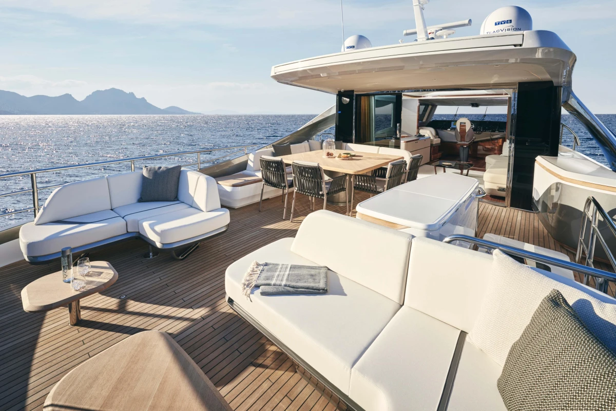 Luxurious 2026 Princess X80 yacht deck with elegant seating and ocean view.