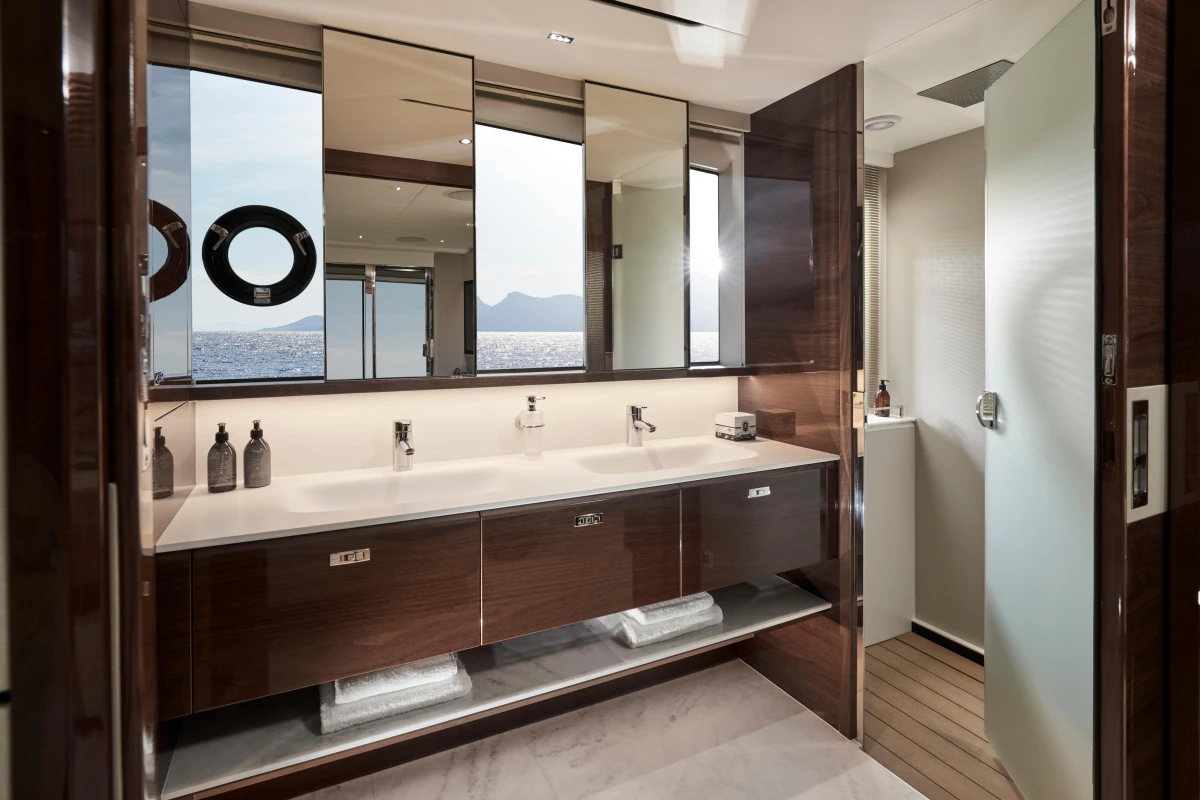 Luxurious bathroom in 2026 Princess X80 yacht with ocean view and modern fixtures.